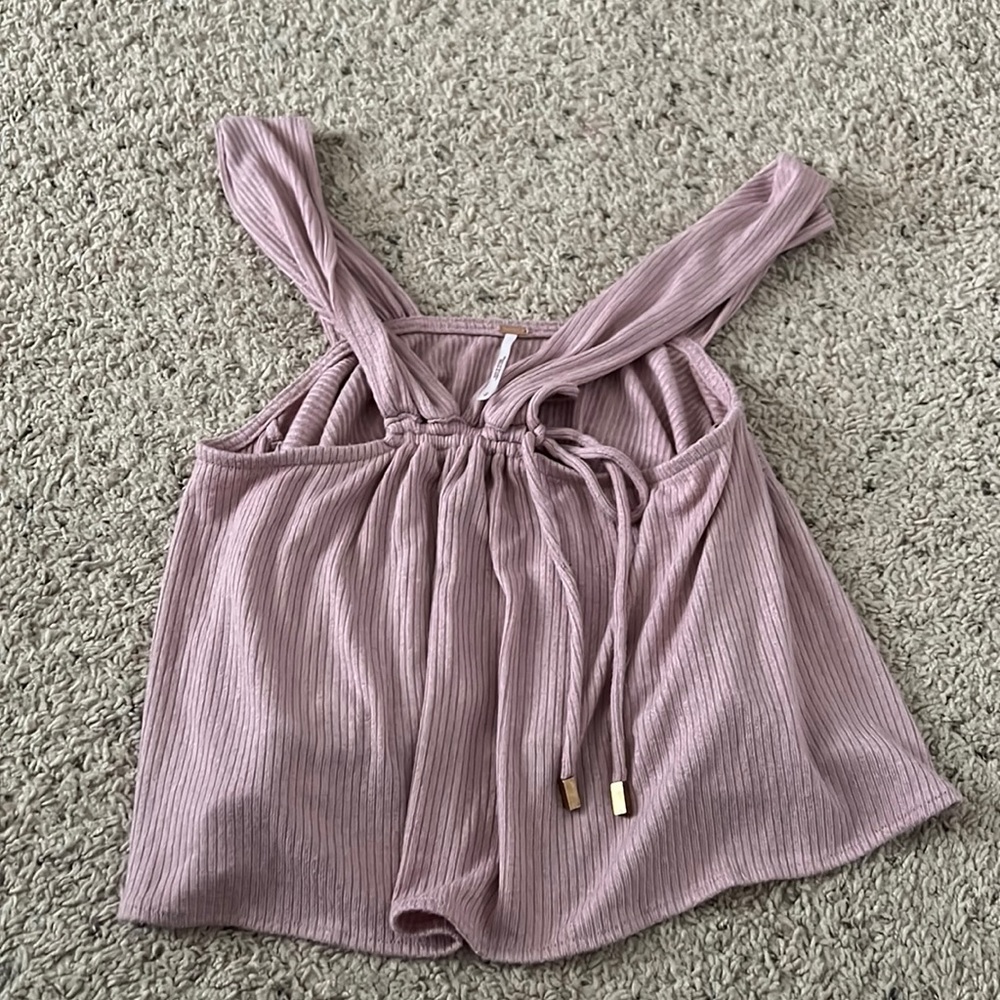 Free people size small cropped shirt NWOT.  Matching pants available in closet